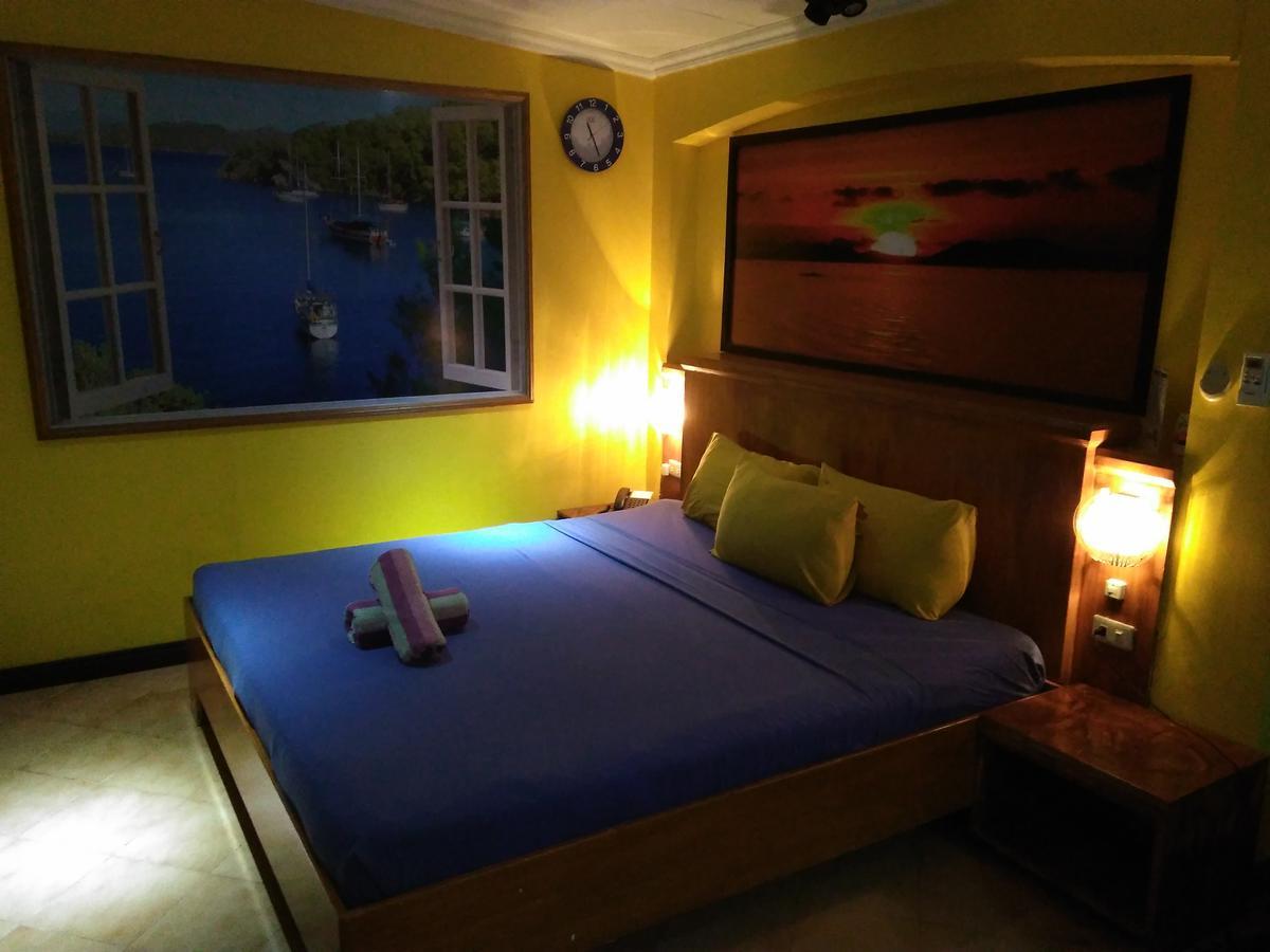 אולונגפו Mango'S Beachfront Resort חדר תמונה
