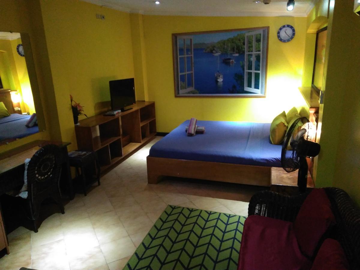אולונגפו Mango'S Beachfront Resort חדר תמונה
